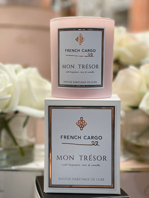 Mon Tresor Candle (My Treasure).  Candel comes in a beautiful white gift box and light pink glas vase