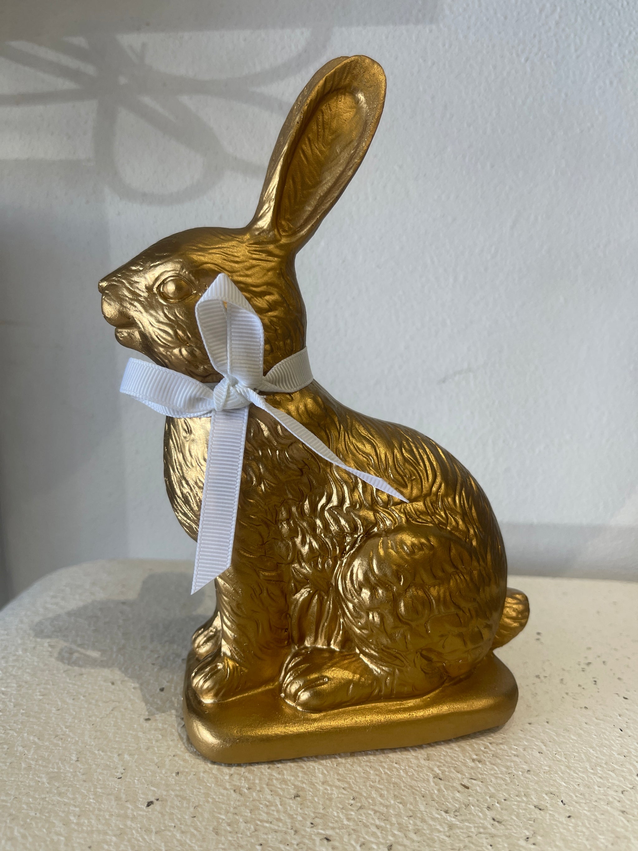 Gold Sitting Rabbit with White Ribbon