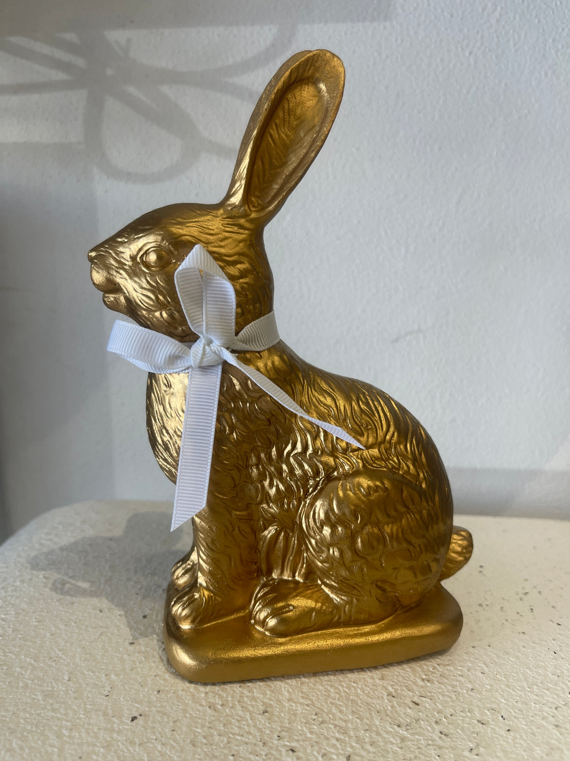 Gold Sitting Rabbit with White Ribbon