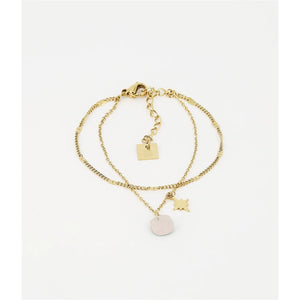 double gold chain bracelet with small rose quartz stone and gold star hanging