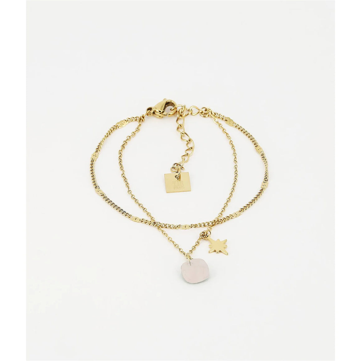 double gold chain bracelet with small rose quartz stone and gold star hanging