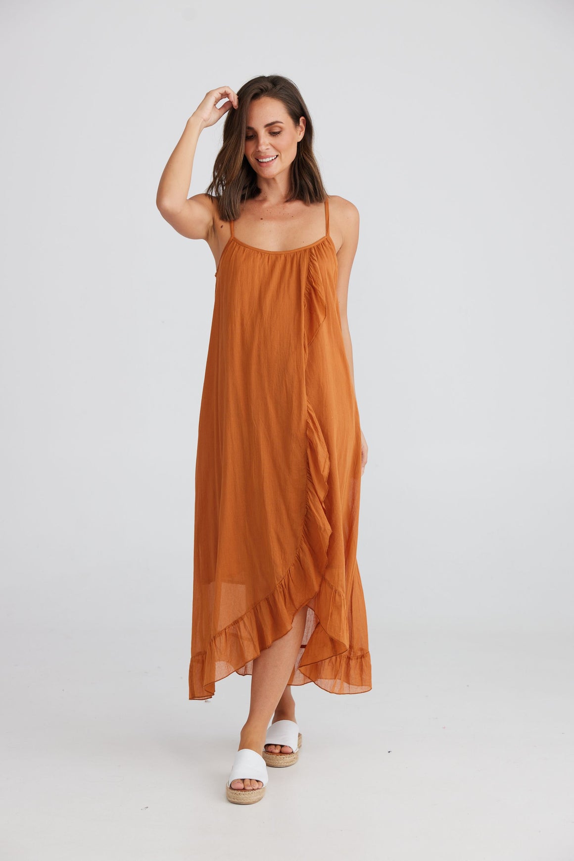 copper coloured cotton summer dress with thin straps and mock wrap ruffle trim
