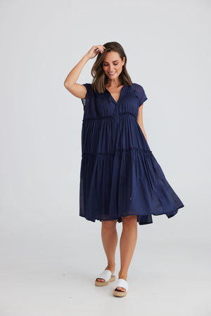 loose navy cotton dress knee length with ruffled panels